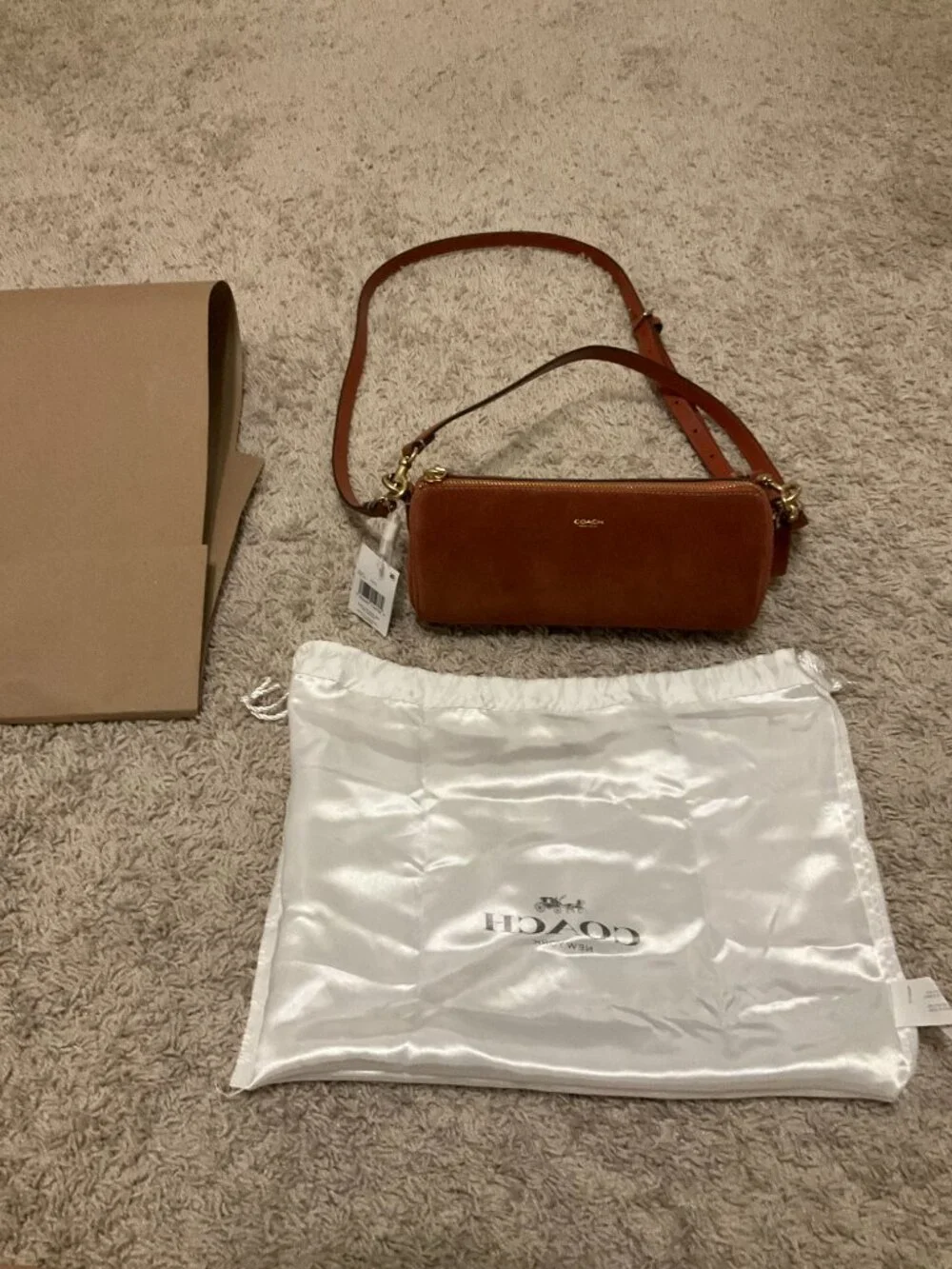 COACH barrel bag. brass/clay. CDy81.